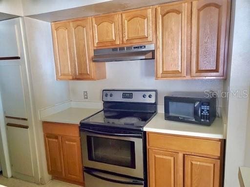 kitchen featuring stainless steel electric range oven