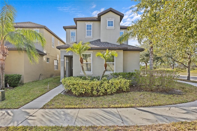 view of front facade with a front yard