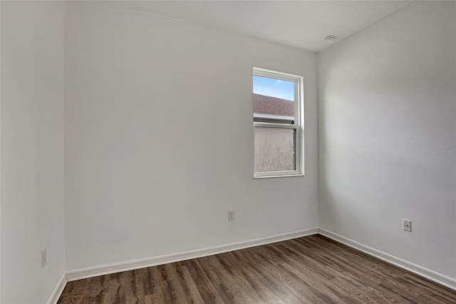 spare room featuring hardwood / wood-style flooring