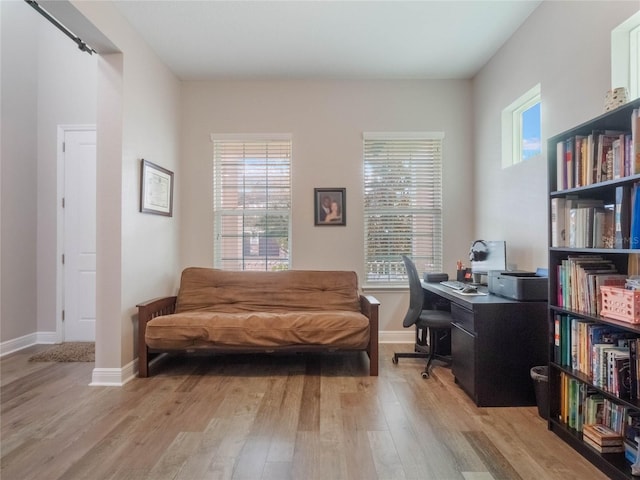 office area with light hardwood / wood-style flooring