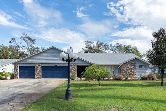 ranch-style house with a garage and a front yard