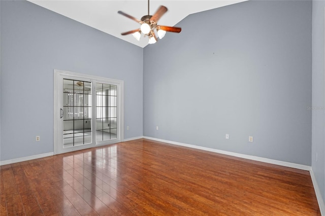 empty room with wood-type flooring, vaulted ceiling, and ceiling fan