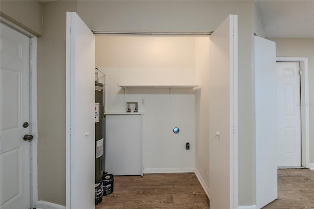 clothes washing area with washer hookup and hardwood / wood-style floors