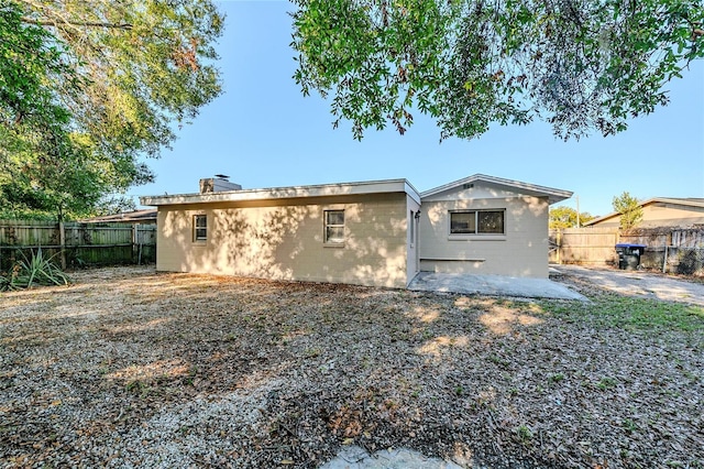 rear view of property with a patio area