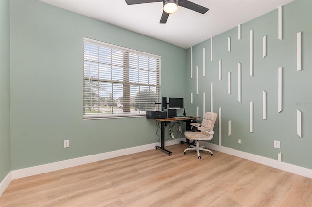 office area with ceiling fan and light hardwood / wood-style floors