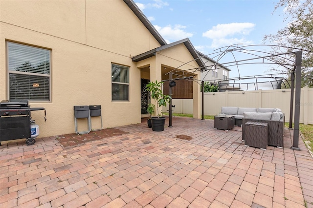 view of patio / terrace with outdoor lounge area and a grill