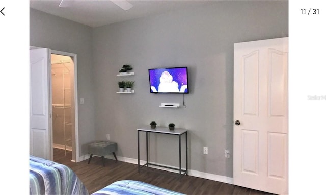 bedroom with ceiling fan and dark hardwood / wood-style flooring