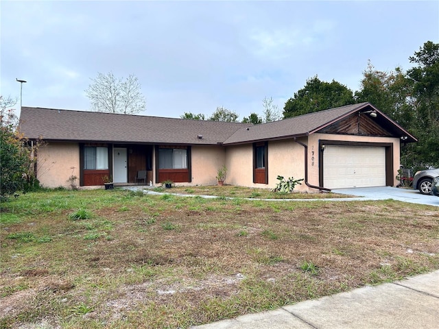 single story home featuring a garage