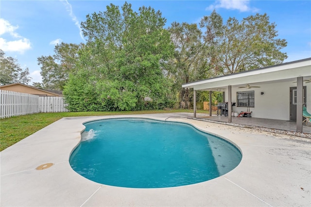 view of pool with ceiling fan and a patio area