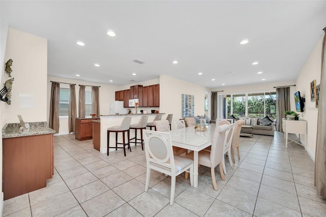 dining room with light tile patterned floors