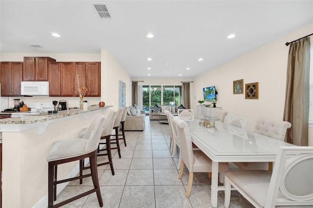 view of tiled dining room