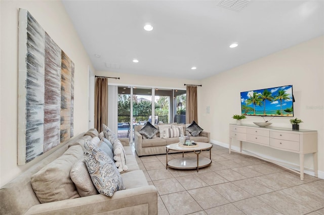 living room featuring light tile patterned flooring