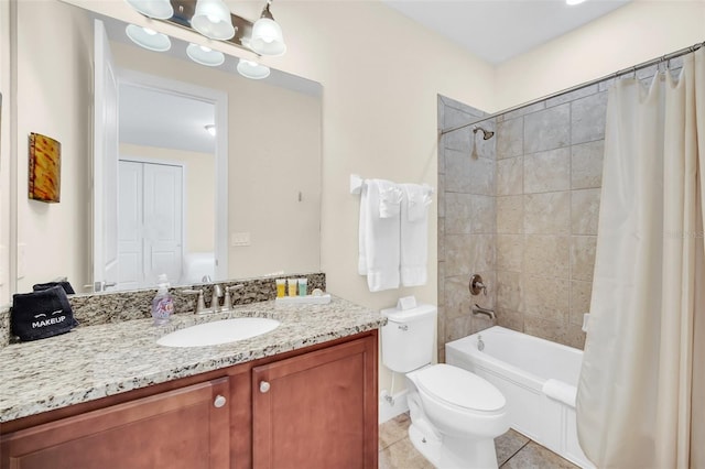 full bathroom featuring tile patterned floors, vanity, toilet, and shower / bathtub combination with curtain