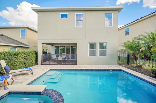 view of swimming pool featuring a patio area