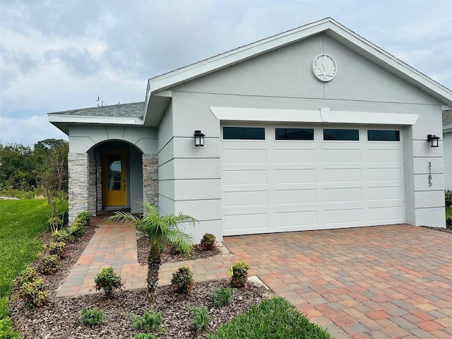 view of front of property with a garage