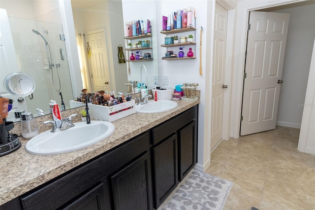 bathroom featuring vanity and an enclosed shower