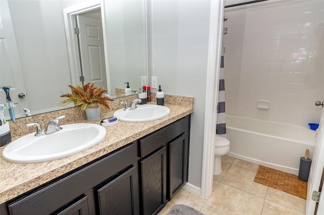 full bathroom with tile patterned flooring, vanity, toilet, and shower / tub combo