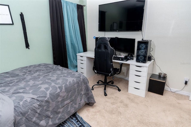 bedroom with light carpet