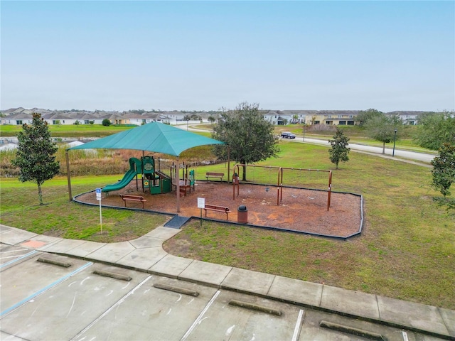 view of playground featuring a yard