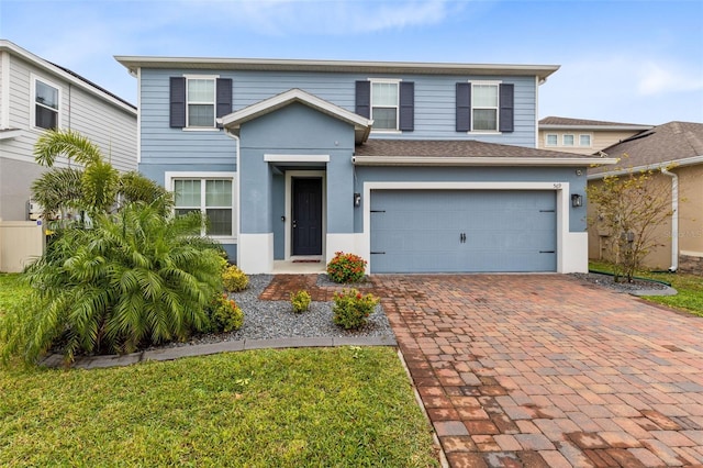 view of front of property featuring a garage