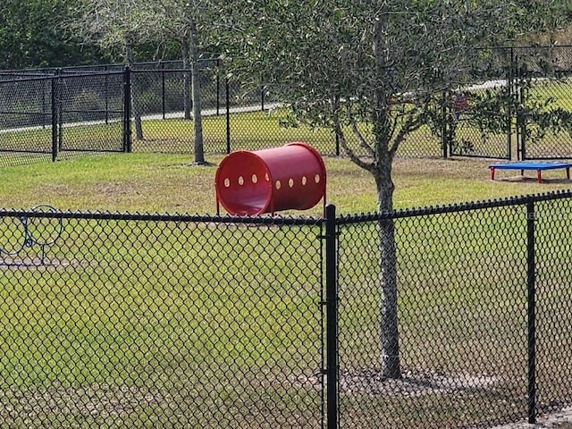 view of home's community featuring a lawn