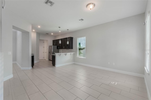 interior space with light tile patterned floors