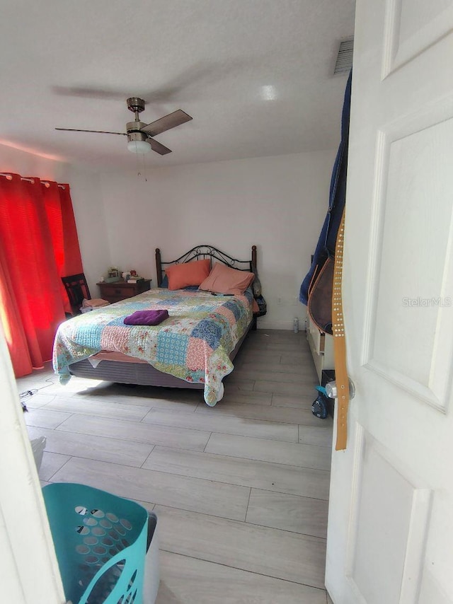 bedroom featuring ceiling fan