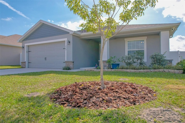 single story home with a garage and a front lawn