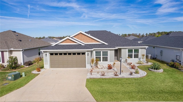 ranch-style house featuring a garage and a front yard