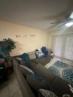 living room featuring ceiling fan