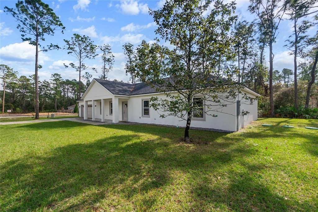 ranch-style home with a front yard