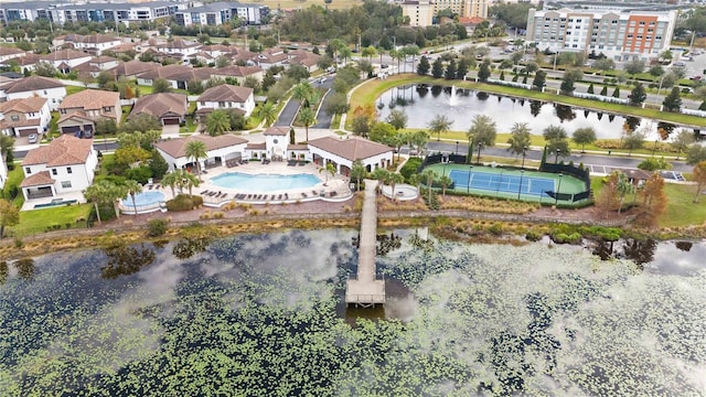 birds eye view of property featuring a water view