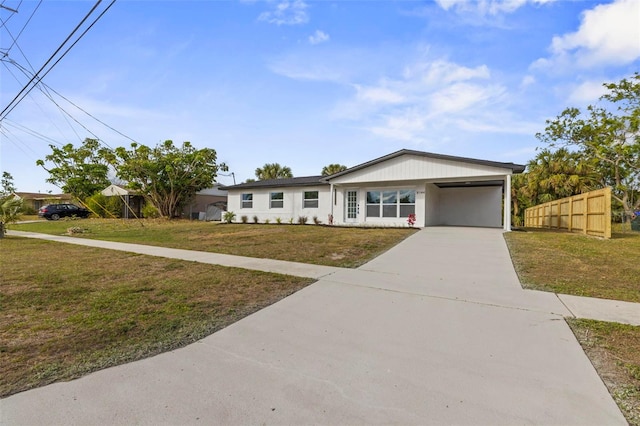 single story home with a front lawn