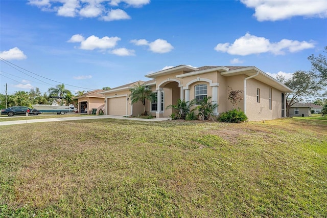 view of front of property with a garage and a front lawn