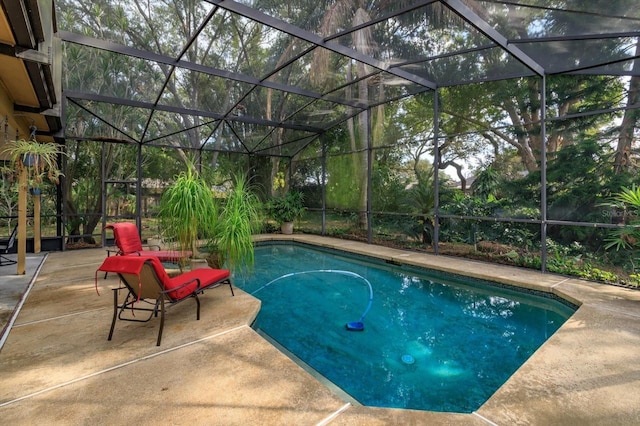 view of pool featuring a lanai and a patio