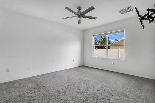 carpeted empty room with ceiling fan