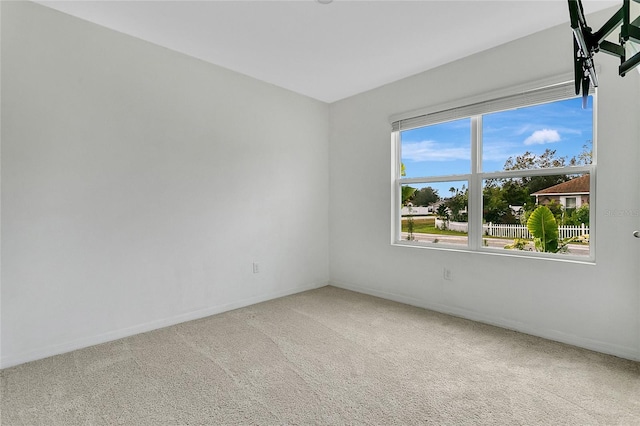 spare room with carpet flooring