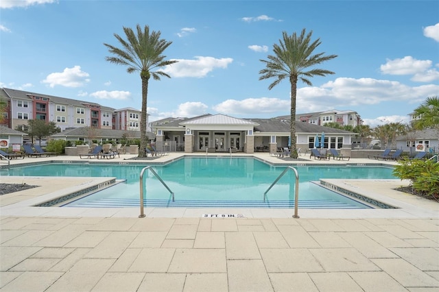 view of swimming pool featuring a patio