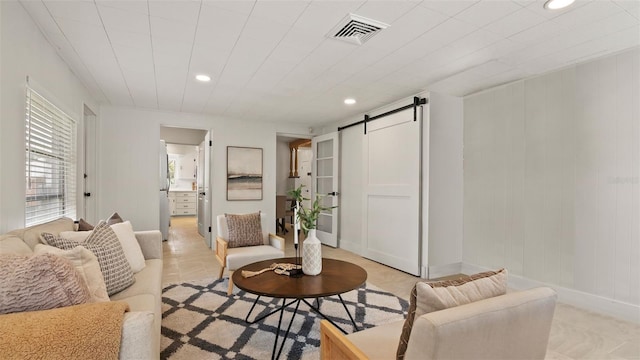 living room with a barn door