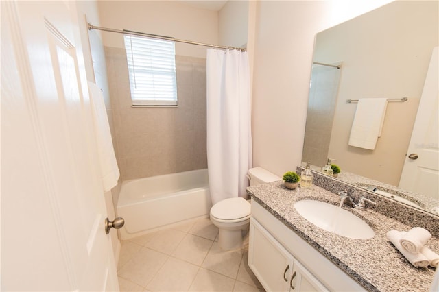 full bathroom featuring tile patterned flooring, shower / tub combo, vanity, and toilet