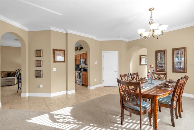 tiled dining room with an inviting chandelier and crown molding