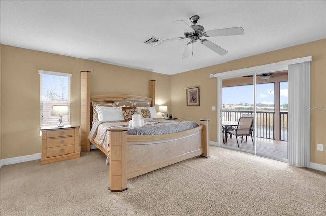 carpeted bedroom featuring ceiling fan and access to outside