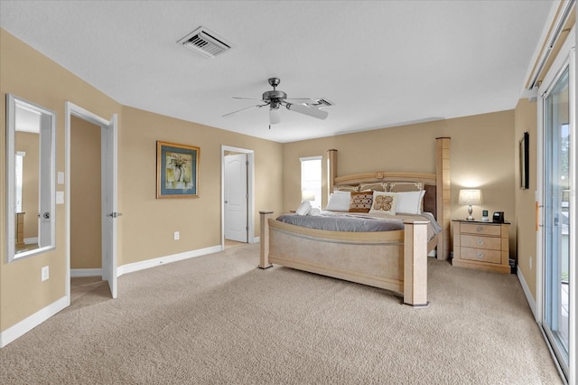 bedroom featuring ceiling fan and light colored carpet