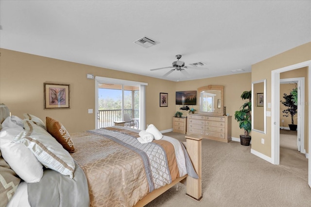 carpeted bedroom featuring access to outside and ceiling fan