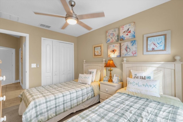 bedroom with a closet and ceiling fan