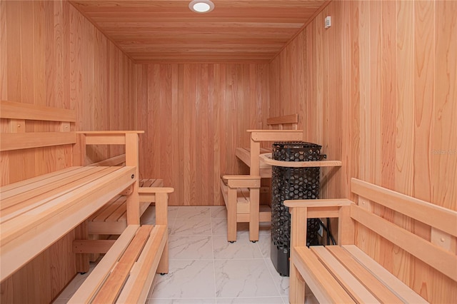 view of sauna with marble finish floor