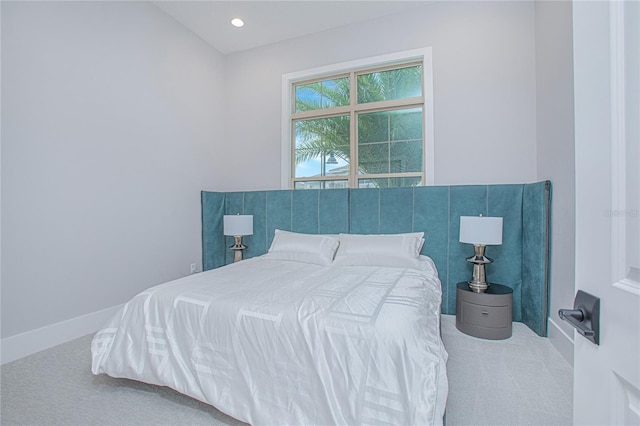 carpeted bedroom with recessed lighting and baseboards