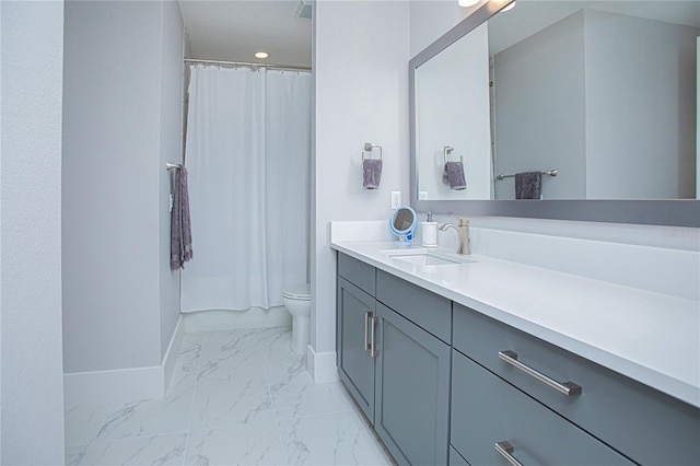 full bathroom featuring a shower with curtain, toilet, marble finish floor, baseboards, and vanity