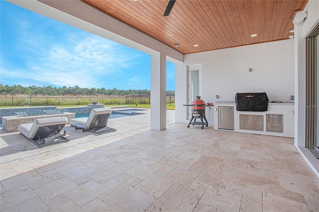 view of patio / terrace with a fenced backyard, a grill, a fenced in pool, ceiling fan, and a hot tub