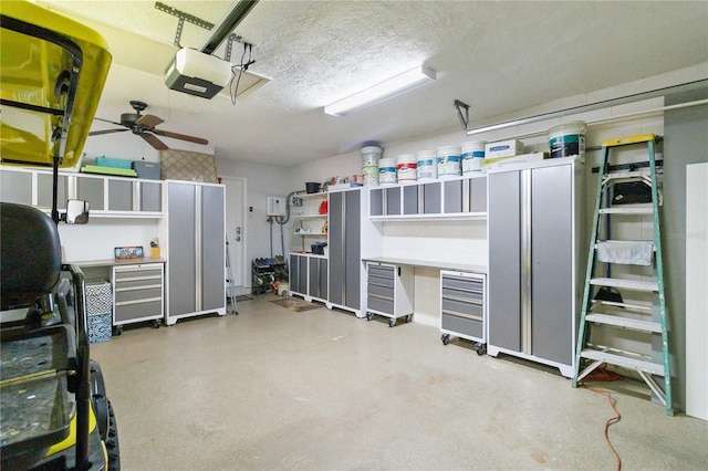 garage featuring ceiling fan and a garage door opener